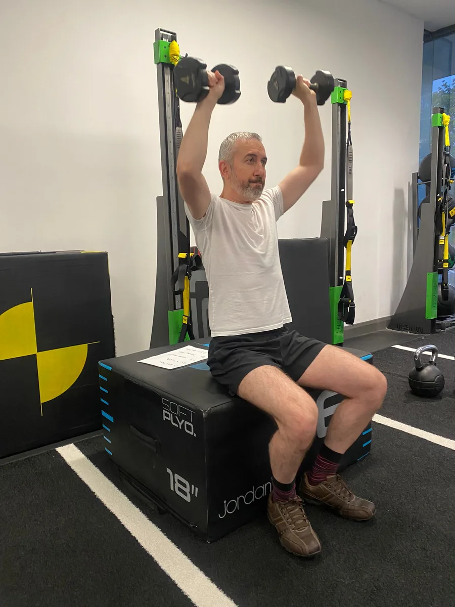 A member training with dumbbells at The Good Gym MK