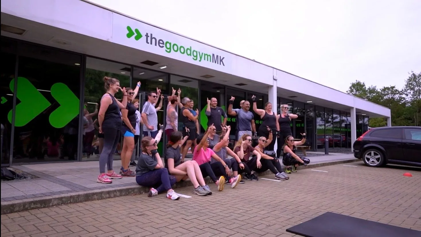 The GGMK community together outside the club at Kiln Farm